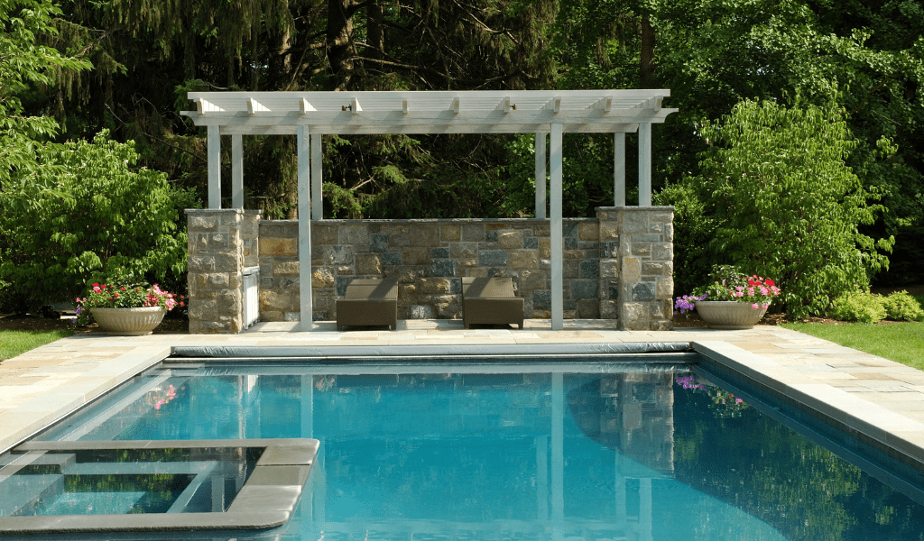 pool pergola with outdoor chairs
